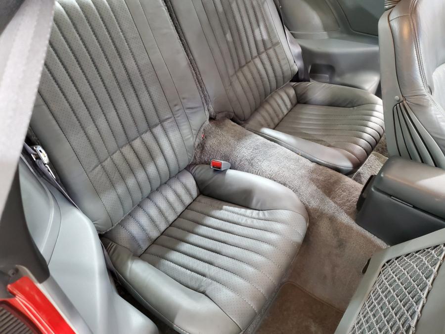 Интерьер Pontiac Firebird Trans Am GTA T-Roof 1989 года  (фото 23 из 55)